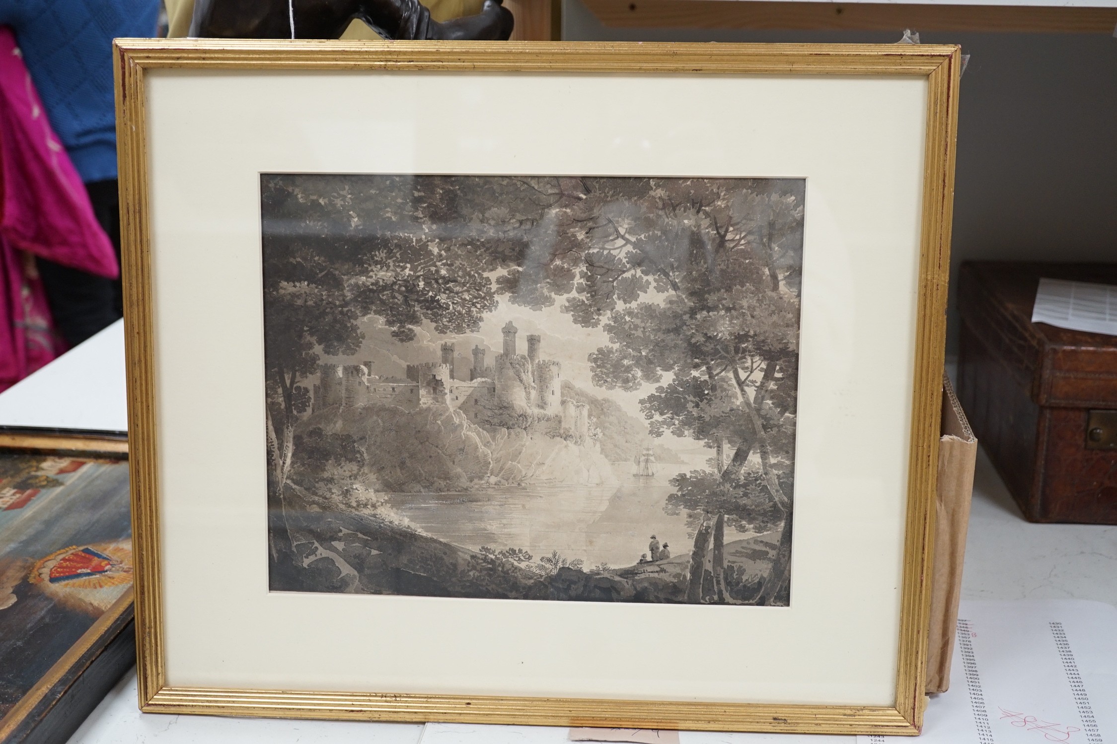 Early 19th century English School, monochrome watercolour, Coastal castle viewed from woods, 27 x 33cm